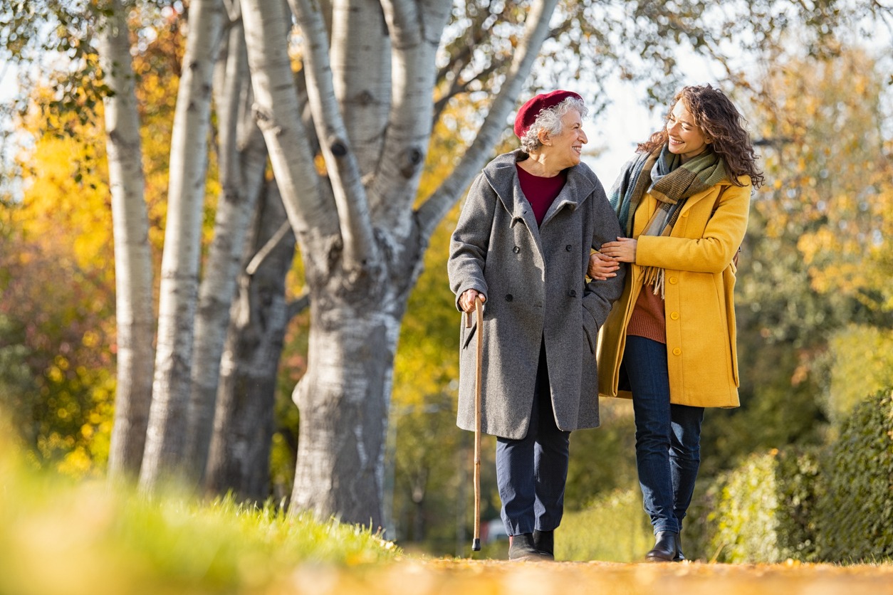 woman with grandmother walking