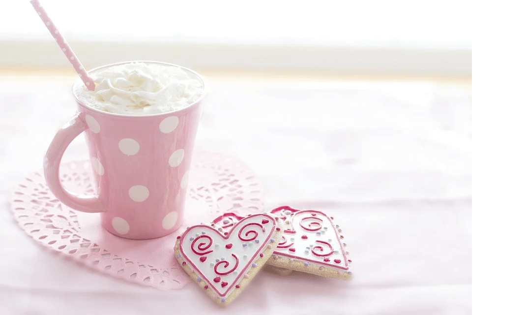 a hot chocolate drink served in Christmas