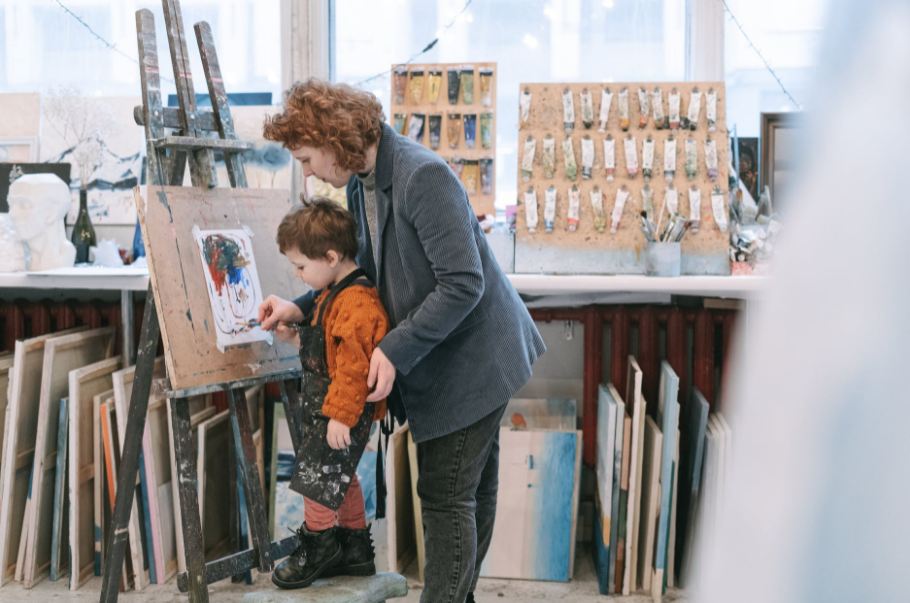 a-boy-learning-how-to-paint