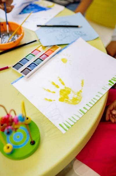 art-materials-and-painting-of-a-hand-on-table
