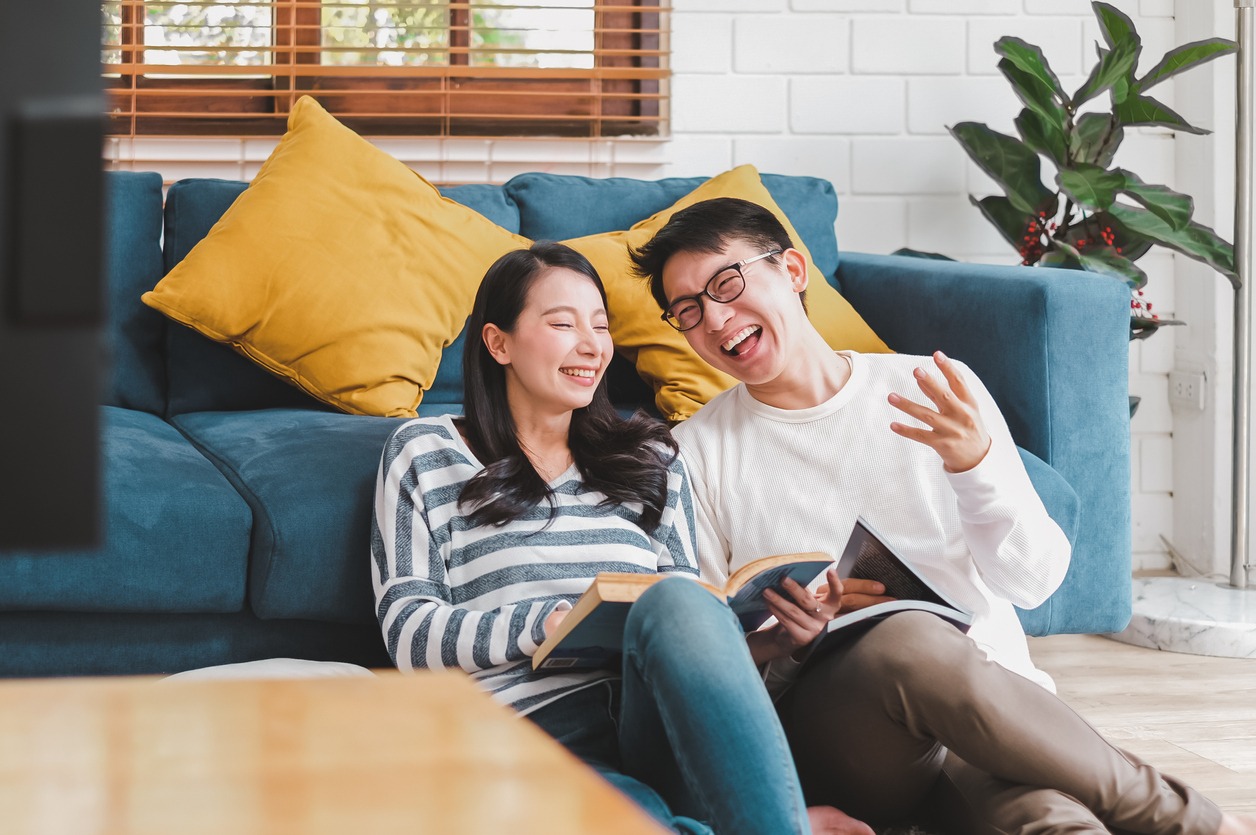 Lifestyle Asian couple man and woman talking working spend time together at home, Asian couple family lifestyle concept