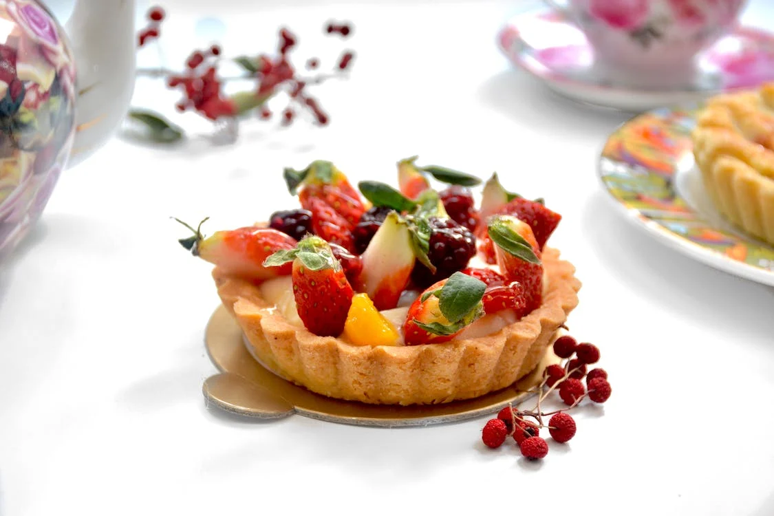 Colorful fruit tart with berries on top